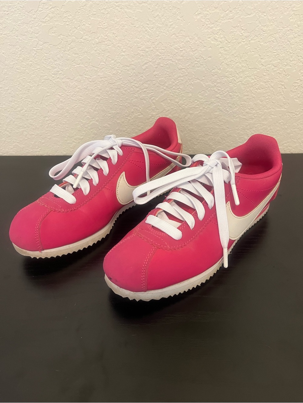 Nike Women’s Hot Pink Cortez sneakers